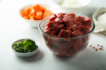 Raw beef with vegetables ready for cooking