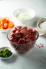 Raw beef with vegetables ready for cooking