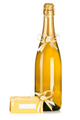 Corked bottle of champagne with wedding decoration flower boutonniere and invitation card on white background