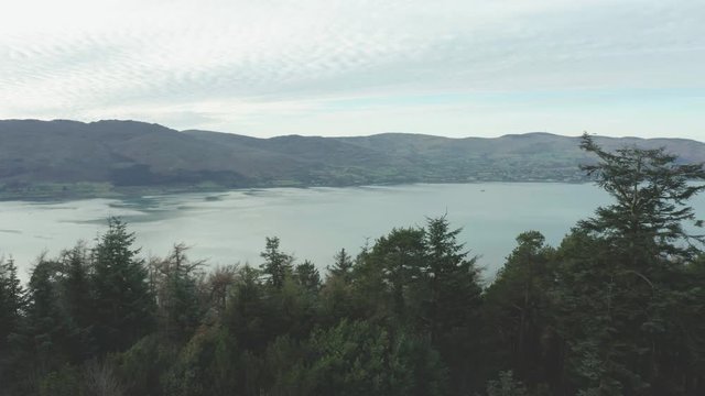 Aerial Flight view of  rostrevor mountain and calingford lough, Newry, Northern Ireland during Winter time. Hiking And Tourism Concept