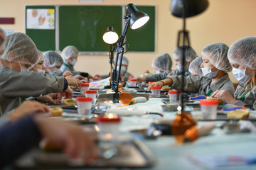 interior of the dental office. Dentists tools in a modern class at a medical university. pupil out of focus