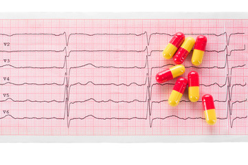Cardiology. Macro of ECG graph and cardio pills