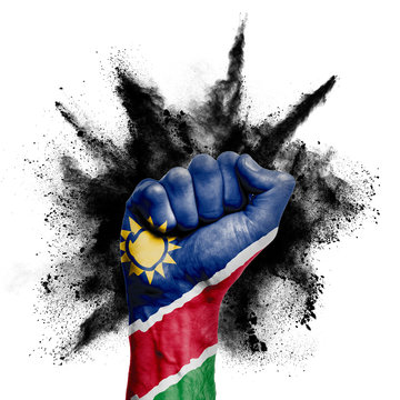 Namibia raised fist with powder explosion, power, protest concept