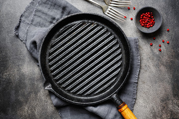 Empty iron grill pan on table