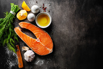 Raw fish steaks with ingredients