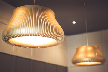 Modern vintage design of lamp in home. A hanging light on ceiling