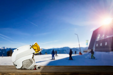 Fototapeta na wymiar Desk of free space and winter ski equipment.Blue sky and sunny day. 