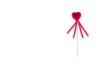 Red heart shapes on white background for Valentine's Day.