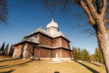 Exterior of Hoszowczyk Wooden Orthodox Church.  Bieszczady Architecture in Winter. Carpathia Region in Poland