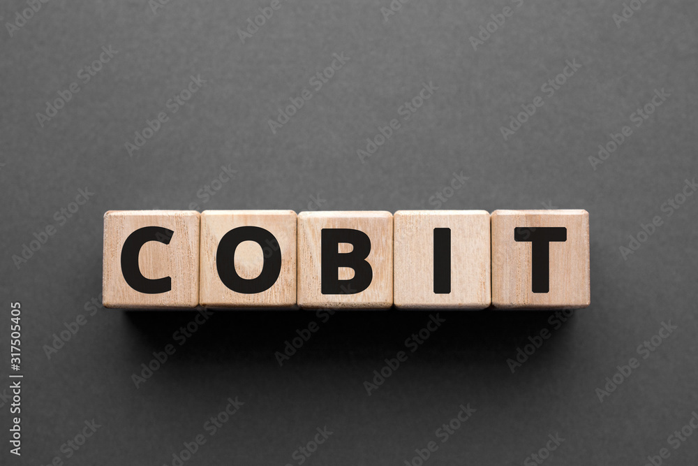 Poster cobit - words from wooden blocks with letters, control objectives for information and related techno