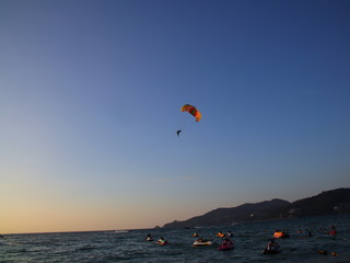 Parasailing at Patong Phuket Thailand at Sunset beautiful colours