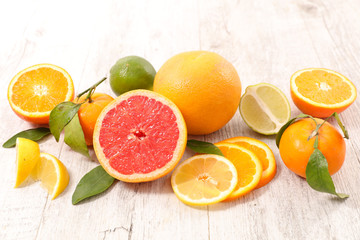 Naklejka na ściany i meble assortment of citrus fruit with lemon, orange,grapefruit,lime