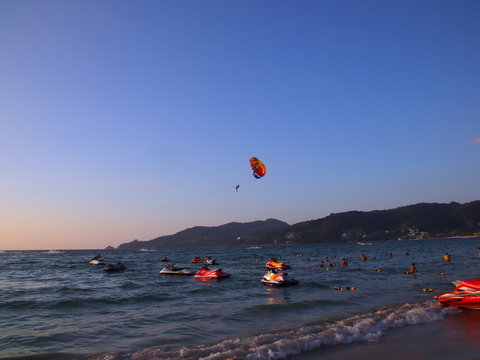 Parasailing at Patong Phuket Thailand at Sunset beautiful colours