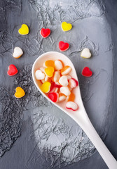 Hearts sweets in spoon