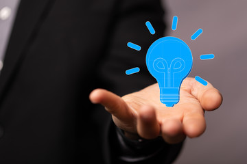 idea lamp concept in hand.