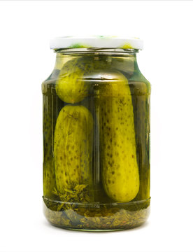 canned pickled cucumbers on white