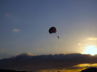 Parasailing at Patong Phuket Thailand at Sunset beautiful colours