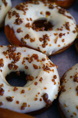 Fresh pumpkin donuts with white icing