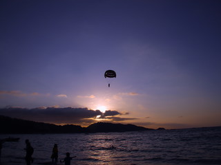 Parasailing at Patong Phuket Thailand at Sunset beautiful colours