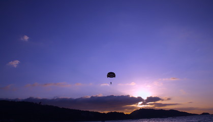 Parasailing at Patong Phuket Thailand at Sunset beautiful colours