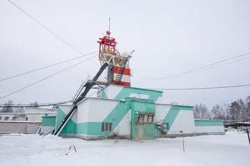 Emerald mine headframe building