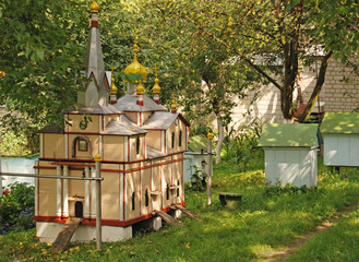 Beehive in the form of Trinity Cathedral at the monastery apiary in Korets