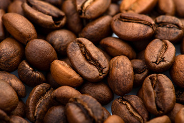 Coffee beans close-up background. Fresh roasted