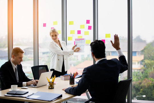 Young Passionate Businesswoman Explaining Her Idea In The Meeting Room