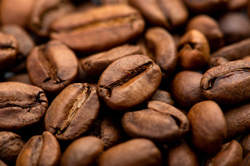 Coffee beans close-up background. Fresh roasted