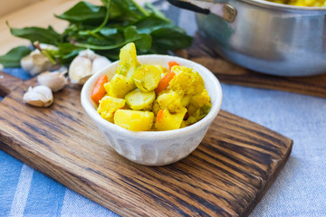 Vegetable stew. Potato, cabbage, cauliflower, carrot. Vegan food and healthy diet.