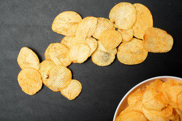 Crispy potato chips in a bowl