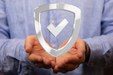 cyber shield protection concept holding in hand