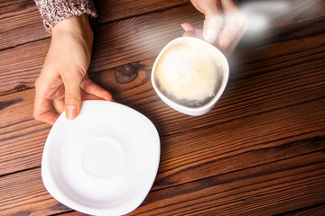 female hands and coffee