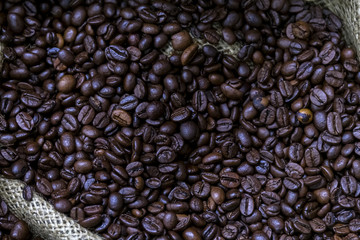 Coffee beans in a canvas bag.