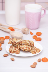 Superfood breakfast granola bars with oats, nuts, berries, fruits. Vertical.