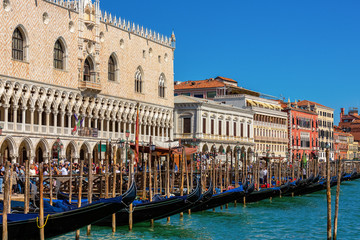 The Grand Canal of Venice, boats and handballs go along the canal.