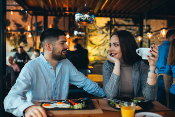 friends having lunch in restaurant
