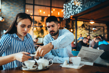 couple drinking tea in cafeteria