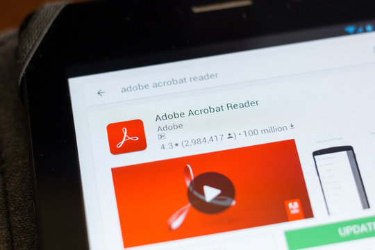 Ryazan, Russia - June 24, 2018: Adobe Acrobat Reader icon on the list of mobile apps.