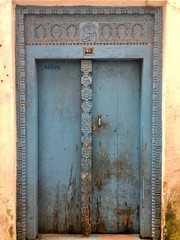 old carved wooden doors in stone town, zanzibar