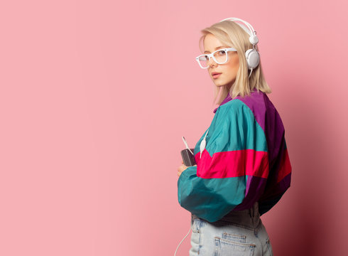 Woman In 90s Clothes With Headphones