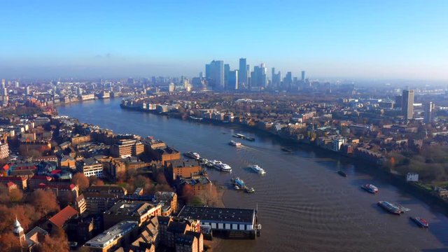 River Thames Aerial Drone Footage, Autumn London View, Canary Wharf, Sunny Day Flight, Cityscape