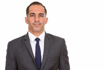 Face of mature handsome Persian businessman in suit