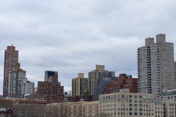Upper East Side Manhattan Skyline with Skyscrapers and Buildings in New York City on a Cloudy Day