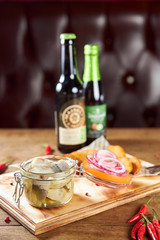 bottle and glass of beer on table