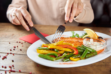woman cutting vegetables in the kitchen