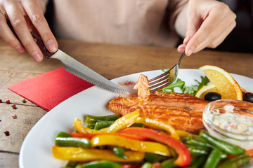 woman eating salad