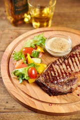 grilled beef steak with vegetables