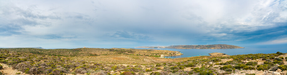 Fototapeta na wymiar Panorama of stone desert. Panoramic Landscape of Comino Island, Malta