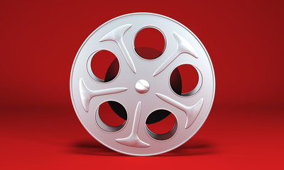 front view of a film reel with a film strip in front of it (3d render)